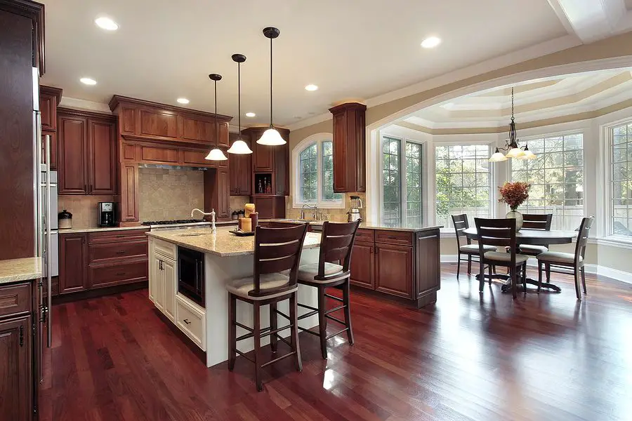 Kitchen with eating area and cherry wood flooring